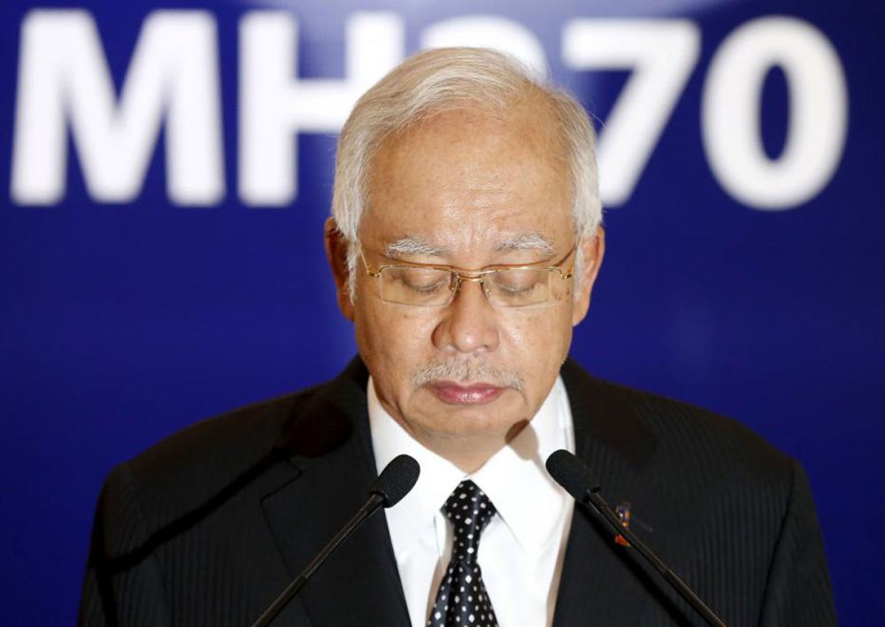 马来西亚移民部禁止前总理纳吉布和妻子离境